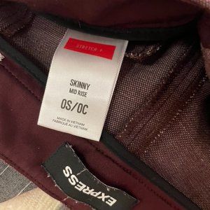 Express mid-rise skinny pant. Dark red; size 0S.